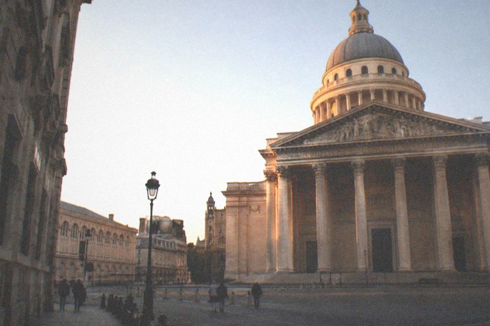 The Panthéon at dusk, its facade lit and the Place du Panthéon quiet after the crowds have gone