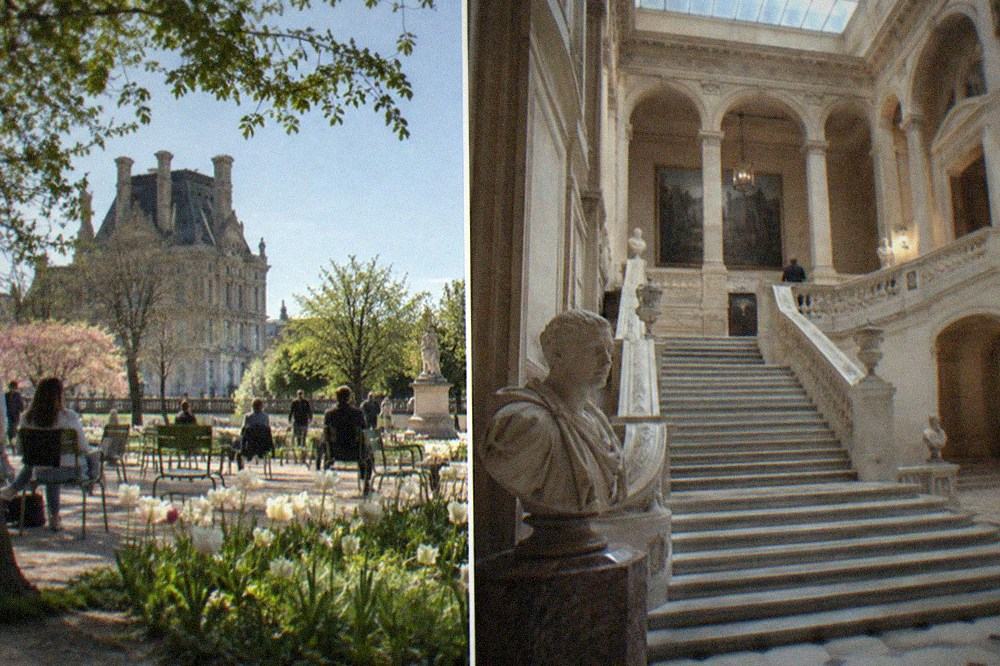 A grand mansion interior with a divided staircase, marble busts and a glass skylight.