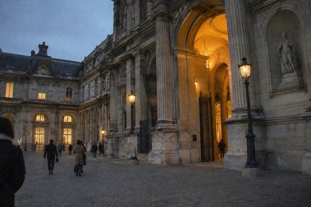 Medieval stone facade of a Paris museum entrance