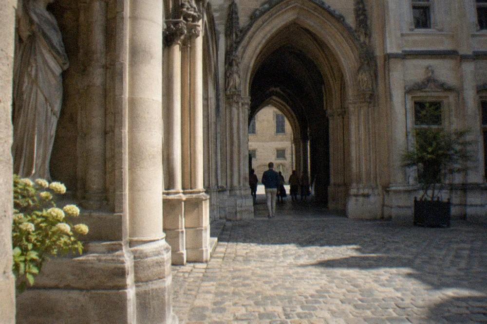Carved stone portal and Gothic archway inside a Paris history museum