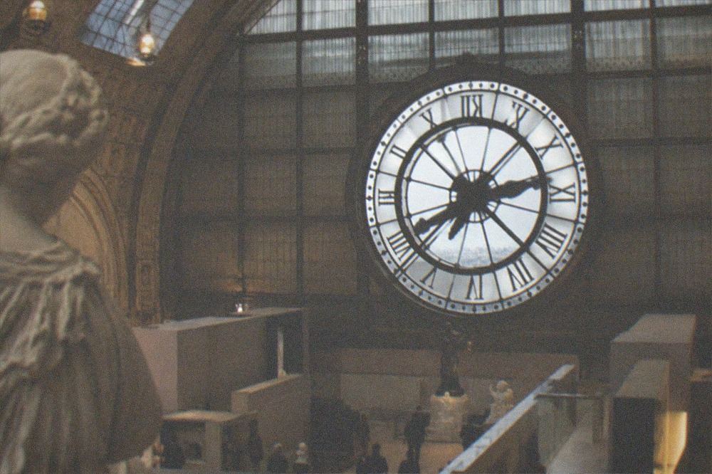 The grand clock window inside a Beaux-Arts railway station museum