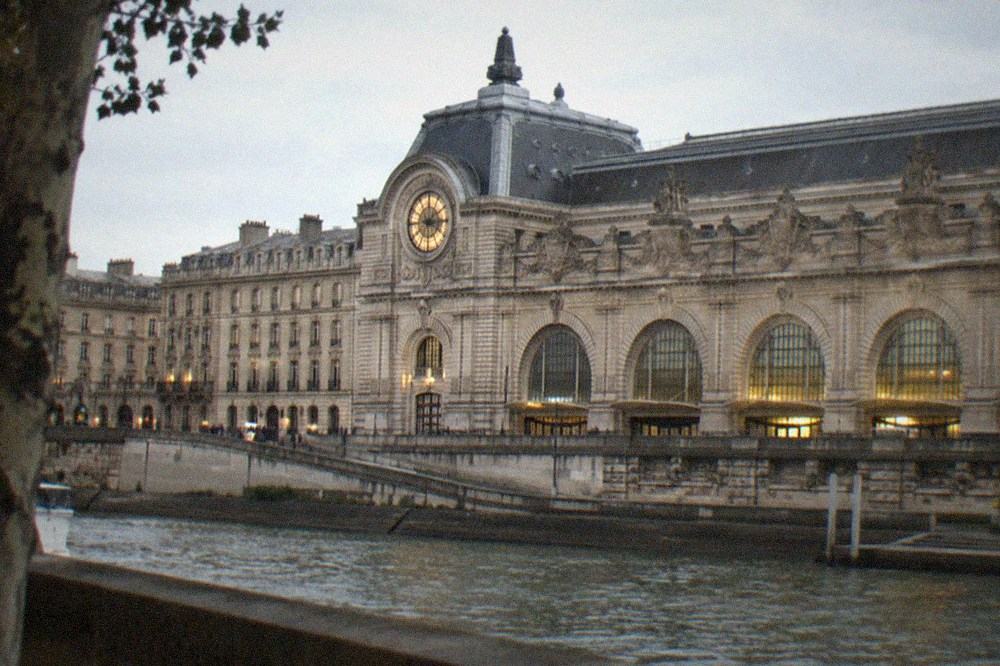 A clock face of the Musée d'Orsay seen from the Seine embankment