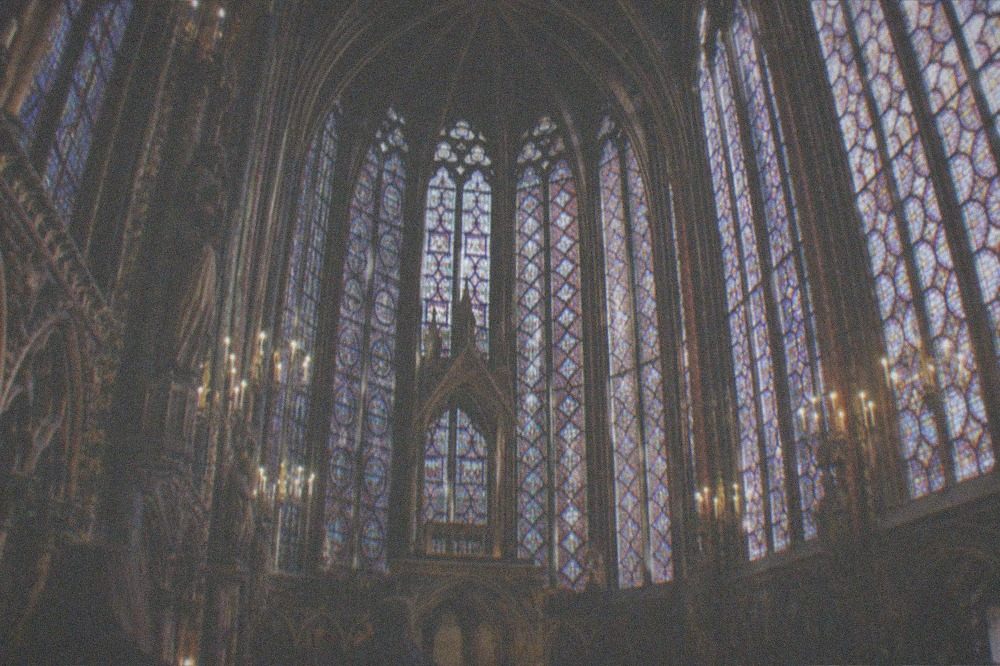 Stained glass windows of the Sainte-Chapelle filling the upper chapel with colour