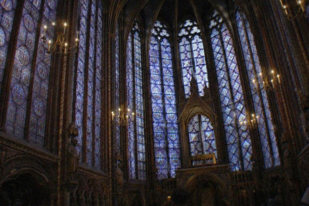 The blue stained glass windows of Sainte-Chapelle seen from inside the upper chapel